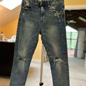 Distressed Slim fit stretch jeans.